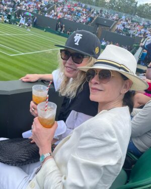 Julianna Margulies Instagram - So much fun at Wimbledon! 
Laughed, watched, 
sipped some Pimms and even got a sweaty hug from Tiafoe after his victory in the first round.
@chelseahandler thanks for being my date! 💕 
#wimbledon