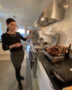Julianna Margulies Instagram - Unveiling the turkey! Also, as the cook it’s always tricky what to wear for Thanksgiving because I have to cook in my clogs, it’s just the way it is, so dress it up with some necklaces and pray they don’t take full length pics Ps: my mother-in-law who took this picture forgot the memo 😂😂😂 #thanksgiving