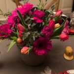 Julianna Margulies Instagram - I know, I start my table setting early because there’s so much to do with all the food, but my favorite part is setting the table and making it different every year. I went to our local flower shop to make my arrangements and they didn’t have a lot to choose from so I went with what they had. Also…. Chocolate turkeys by every plate is a staple. Happy pre thanksgiving!