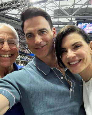 Julianna Margulies Instagram - What an amazing day @usopen yesterday for the men’s semifinals!
Thank you so much @cadillac for hosting us!
We took my father-in-law for his 80th birthday and had the best time
Happy Birthday Ken! We love you!
#usopen #cadillac #usta 
Also… because people keep asking: the jumpsuit I’m wearing is from @narciso_rodriguez  capsule collection for @zara