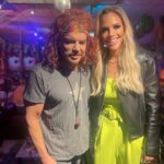Julie Stewart-Binks Instagram - In my festive era 🎄🪩❄️ #decembertoremember #carrottop #vegas #pokerface #mariahcarey #madonna #vip #skating #christmaspartyszn #thecanuck #hockey #redtights #offair