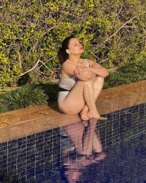 Kanika Maheshwari Instagram - Sun is keeping an eye on me 
Watch it guys 
I’m shining bright into your heart ❤️ 
Love me 
Hate me 
But you can’t ignore me

#sun #sunlight #warmth #love #swimmingpool #swimwear #swimming #relaxing #swim #relaxation #mood #sunshine #happy #happiness #lovinglife #life #blessed #kanikamaheshwari