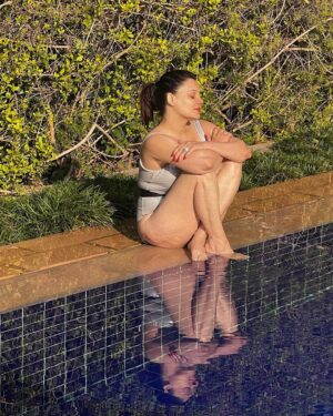 Kanika Maheshwari Instagram - Sun is keeping an eye on me 
Watch it guys 
I’m shining bright into your heart ❤️ 
Love me 
Hate me 
But you can’t ignore me

#sun #sunlight #warmth #love #swimmingpool #swimwear #swimming #relaxing #swim #relaxation #mood #sunshine #happy #happiness #lovinglife #life #blessed #kanikamaheshwari
