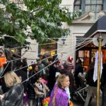 Kathy Najimy Instagram – Walked my smart, funny pal @katiecouric home from a Halloween lunch and we suddenly found ourselves hanging out of a window handing out buckets of candy. I love NYC!