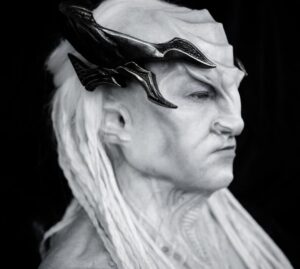 Kenneth Mitchell Instagram - I’m in there somewhere...I think. TENAVIK the guardian. Son of L’Rell. Keeper of the time crystals on Boreth. Klingon. 💎 Portriat by James Mackinnon. BEAUTIFUL character design and collaboration by @nevillepage @glenn_hetrick_  @olatundeo @erikalippoldt @extspace @gershaphillips @versionsofu @nixiepixie13 @jrmackinnon @robincareless @dougaarniokoski @startrekcbs 💙 Thanks for the warm reception and sharing in this meaningful experience. THAT STUNNING CROWN! #StarTrek #StarTrekDiscovery #Tenavik