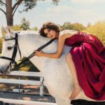 Kerri Kasem Instagram - Looking back on all my horse photos through the last 3 years, this has to be one of my favorites! ♥️ A beautiful shot for @stylecruze Magazine by the brilliant @arezoojalali_photography! TY to the team: Make-Up by @makeupnadiya.ca 💄 Lusitano Jardim MT- @friesiansm 🐴 Red Dress - @itswillfranco ♥️ Collab - @my_cavago 🏇 #fashion #Lusitano #reddress #horse #fbf
