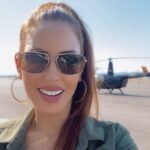 Kerri Kasem Instagram - Flying is my Freedom! 🚁🐎 What’s yours? 💃🏻🏄🏽‍♀️🛩🏕🎶⛵️🏝🏔 #helicopter #R22 #girlpilot #Happiness #flying