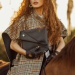 Kerri Kasem Instagram - Behind-the-scenes of a photo shoot I did in Florida at @gilman.stables for @fabukmagazine. I was modeling products for @alaffia. Thank you to my dear friend @nathanaellehottois who is a genius designer and CEO of @fashionweekstudioofficial for having me be a part of your creation! Thanks @emilyjeanrussellphoto for the beautiful photos!!!! @kozysaila - gray and white scarf and purses Thanks again @startyourdaywchristiekay! We would’ve never had Ringo the champion saddlebred or Gilman Stables without you. ♥️🐴♥️ #Saddlebred #FabUK #Alafia
