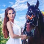Kerri Kasem Instagram - A beautiful day in the park! Love this shot by @mattcali_photography! Thanks @barn_mom_chronicles for sharing Robbie with me… I love him! @sky_is_dlimit - white dress TY @era.australia 💛 #Horses #HorseAndRider #WhiteDress #BeautifulSky