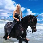 Kerri Kasem Instagram - If there's one thing I learned, it's that nobody is here forever. You have to live for the moment, each and every day . . . the here, the NOW! -Simone Elkeles Come ride with me in beautiful, exotic places! DM @my_cavago @essaouira_horseride @yassine_cavalier #Morocco #BeachRide #BlackHorse #BlondeGirl #khaleesi