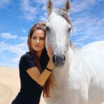 Kerri Kasem Instagram - MOROCCO! 🇲🇦 One of my most favorite places on earth! I can honestly say that @yassine_cavalier has some of the most amazing horses I have ever been around. He is a true horse whisperer. 🐴❤️ For the people who have signed up for the Morocco trip… We are going to have a magical time! ✨ @my_cavago #Morocco #HorsebackRiding #gameofthronestour #Beach