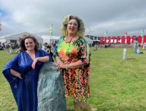 Kiri Pritchard-McLean Instagram - What a life changing few days I've had.
I went to my first ever Eisteddfod and thankfully @s4c made sure I was nestled under the ample bosom of the sweetest, funniest and kindest teacher there is, @magginoggi .

Growing up in Wales and being denied the language when you're young you sense there's stuff you're missing out on but I couldn't have imagined just how much until I visited the Eisteddfod this year. It's indescribable. Part music festival, part food festival, part gallery space, part folk festival,part talent show all Welsh. I was amazed how many people and organisations I knew, how many small businesses I love were there and even though I'd never been before it felt like it had always been waiting for me in a way. 
It's a really magical space. Honestly, I spent the first day fluctuating between laughter and joy and sadness. I was sad I didn't have this in my upbringing - I would have loved it. But, as @tudur reminded me, I have it now. The Eisteddfod can be mine too and just like so many things I've encountered on my Welsh language journey, I've realised when I'm ready for it, it'll welcome me with open arms. 

Oh yeah, and I did stand up in Welsh and as much as I loved it, I think the stress of doing it has knocked about 4 years off my life.
