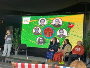 Kiri Pritchard-McLean Instagram - What a life changing few days I've had.
I went to my first ever Eisteddfod and thankfully @s4c made sure I was nestled under the ample bosom of the sweetest, funniest and kindest teacher there is, @magginoggi .

Growing up in Wales and being denied the language when you're young you sense there's stuff you're missing out on but I couldn't have imagined just how much until I visited the Eisteddfod this year. It's indescribable. Part music festival, part food festival, part gallery space, part folk festival,part talent show all Welsh. I was amazed how many people and organisations I knew, how many small businesses I love were there and even though I'd never been before it felt like it had always been waiting for me in a way. 
It's a really magical space. Honestly, I spent the first day fluctuating between laughter and joy and sadness. I was sad I didn't have this in my upbringing - I would have loved it. But, as @tudur reminded me, I have it now. The Eisteddfod can be mine too and just like so many things I've encountered on my Welsh language journey, I've realised when I'm ready for it, it'll welcome me with open arms. 

Oh yeah, and I did stand up in Welsh and as much as I loved it, I think the stress of doing it has knocked about 4 years off my life.