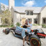 Kristen Bell Instagram - Celebrating @f1 Italy to the MAX. Buckeye meatballs, breakfast pizza and fuel can water. Thank you @redbullracing for the single-seater who took pole position in front of the house. #monza Floral vespa by @erikajaye Linens by @heathertaylorhome Race plates from @bonjourfete