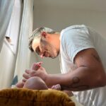 Kristen Gutoskie Instagram - Well, we made it through the 4th trimester. Woosh what a ride. I get emotional going through pictures to post this because wow what a 3.5 months it has been. It has been the most beautiful and most challenging time in my life adjusting to motherhood, and I am deeply grateful for the honour. Our beautiful Lennon Libráda entered the world on a full moon, a week early on June 3rd, 2023. Named in ode to his great Grandpa and great Tita. We had an incredible labour that started at the Dodgers game, so LA of him. 17 hours later, he was here. I would love to share my labour story at some point in the future 💕 We spent a hard week in the nicu but our tough little guy just took minute to get used to being on the outside :) And since then it has been a whirlwind. I will be honest to say I really struggled with the ups and downs of hormones and healing in postpartum and learning to parent so instantly. You love this new creature so much it’s painful. Your old life is in the rear view mirror. Breastfeeding is so freaking hard at first and my god, the sleep deprivation. But here we are, finally getting the hang of it. Seeing our love’s personality emerge and all the smiles and coo’s and watching him discover things for the first time is just the best thing I’ve ever witnessed. Watching @brianleeboehner be such a beautiful papa reading Lennon books every morning and changing diapers like a boss. Every morning when we wake up, I say “I love youuu” and Lennon returns it with “Ow gooo”. Hands down my favourite new word. I am deeply humbled to be your mama Lenny Bear, the greatest love I’ve ever known. Cannot wait to see what else this journey has in store for us.