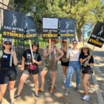 Kristen Gutoskie Instagram - Post partum picket! Finally felt ready to venture out for a little and walk in solidarity with our unions! AMPTP will you PAY US please so all of our members can have health insurance and a living wage? We’re asking for a drop in your big fancy pond for our livelihoods and our families. @sagaftra @wgawest #sagaftra #wgastrong #onstrike #dontletthebastardsgrindyoudown The Walt Disney Studios