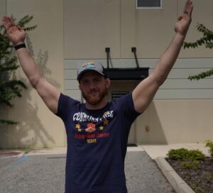 Kyle Greenwood Instagram - I’m PROUD to support @ConnorsCure during #PediatricCancerAwarenessMonth. Join me and fo the “V” for #VictoryOverCancer and tag @TheVFoundation @WWECommunity Shop Here: https://shop.wwe.com/collections/connors-cure