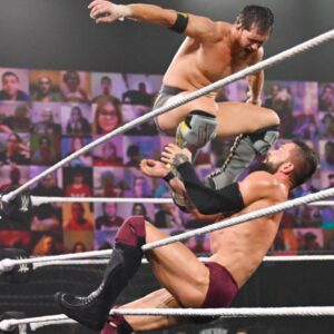 Kyle Greenwood Instagram - One year removed from the fight of a lifetime. We left it all in the ring yet I’m forever changed as a wrestler, so cheers @finnbalor 10/4/20