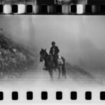 Lado Kvataniya Instagram - MGZAVREBI [WALTZ] • Backstage On 27 January 2022 I scouted locations with Gigi Dedalamazishvili, the frontman of Mgzavrebi. Together we focused on authentically rural location, high in the mountains. We got caught in a snowstorm that was threatening avalanches. We were lucky not to get stuck in the mountains for a couple of weeks, without any food or means of communication. It is worth mentioning that none of the video’s B&W footage is archival. I shot that personally. The result becomes a metaphor for a world inhabited by the departed. We shooting with a Bolex from the 1960s – and that gave us the newsreel effect we sought. The resulting footage included plenty of spoiled shots and underexposure, which actually increased that sense of an old newsreel. It’s a miracle we managed to record a sense of fragile timelessness, of life in the Georgian countryside. Exactly nine months after our first scouting trip – on 27 October 2022(9 months) – we wound up by filming the birth of a child. While Gigi and I picked mountain locations, our future protagonist was conceived somewhere in Tbilisi. *** 27 января 2022 года мы с Гиги впервые отправились на отсмотр локаций в Бахмаро - это аутентичная деревенская местность далеко в горах примерно в 5 часах езды от Тбилиси. В ту поездку мы попали в снежную бурю, нам повезло не застрять в горах на пару недель без связи и провианта. Ровно через 9 месяцев, 27 октября, мы закончили съёмки нашего фильма и зафиксировали на киноплёнку рождение ребёнка. Получается, пока в январе мы с Гиги выбирали объекты в горах, где-то в Тбилиси происходило зачатие будущего героя нашей истории. Важно отметить, что чёрно-белый материал в клипе - не архивная хроника, этот материал я снимал сам в Раче и Бахмаро, высокогорных грузинских деревнях. Мы разделили производственный период на два блока - документальный и игровой, и первым делом мне необходимо было получить хроникальный материал - некий слепок метафоры мира, в котором живут ушедшие. В материале было огромное количество брака, засветов, которые помогли усилить эффект кинохроники. Чудо, что нам удалось зафиксировать это хрупкое безвременье. Georgia, Tbilisi