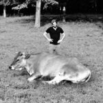 Liam Hemsworth Instagram - My massive mate Eddie. He’s laying on my wallet...anyone know how to move a 2500lb bull?