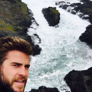 Liam Hemsworth Instagram - #WorldOceansDay  I almost died taking this photo on the side of a cliff in hurricane type weather but that's how much I love and care about the ocean. Today is about celebrating one of the most important resources on our planet. We must work together to protect it for future generations. #ItsNotOk #WorldOceansDay #100islandsprotected