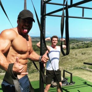 Liam Hemsworth Instagram - Took it upon myself to teach @rossedgley how to train properly. With my help I see some real potential in him. Keep up the good work little guy ;)