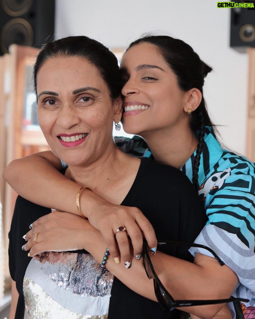 Lilly Singh Instagram - Flew home to Toronto for 72 hours to surprise my mom and family. What are your family parties like? 👇🏽 My mom called me multiple times over the past couple weeks trying to convince me to fly back home for my Pooa’s (aunts) birthday party. I told her I couldn’t because I had so many upcoming travels, which is true. She reluctantly understood. But then two weeks ago, I decided to say EFF IT and booked a flight. I woke up at 4am, flew to Toronto, got myself to my parents house and FaceTimed them. I said, “mom I’m at a really cute place right now, look!” I flipped the screen around and watched with amusement as my mom and dad both starred at an a image of their house with utter confusion. I waited a whole minute for them to comprehend but they didn’t. Finally I said, “I’m outside bro!!” Later I found out that they thought I was showing them something made with AI 🥹 Last night was the party and honestly, it was pure soul food. So much of us live life online, curating the best moments of our day, worried about what people think and trying to put on the slightest facade. And that’s cool from time to time, but there’s nothing quite like sitting with people you love, doing nothing but being imperfect and living in the moment. Sure famous DJs are cool but have you ever played Antakshari with a bunch of competitive aunties? All my Bollywood training leads me to these moments (see slide 5). A few highlights from yesterday: •I had Gol Guppay after so long and ate 10 🤤 •seeing my aunties react to me surprising them. If you didn’t know, my aunties call themselves The Fun Gang (what’s app group certified) and my favourite thing is surprising them 😱 •I handle the bartending and DJing and I take my jobs very seriously #vibesdirector it is my #1 duty to ensure O Tina O Tina plays in full force whenever my sister @thetinasingh is on the dance floor 💃🏽 •ending the night with no music, no dancing and just an hour of conversation, recounting old memories (like the time my cousin and I were stuck inside a bouncy castle that was deflating…) 🏰 I’m so grateful for this life, these people and feeling so much love ❤️