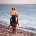 Linda Evans Instagram – Take time for sweet joys. It does wonders for the soul. 💕 #throwback to riding horseback by the sea