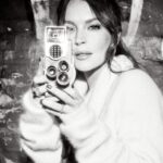 Lindsay Lohan Instagram - Cosmo Photoshoot 💚 Outfit 1: Anthony Vaccarello dress, Albright Fashion Library. Outfit 2: Anthony Vaccarello dress, Albright Fashion Library. Chopard ring (left). Lindsay's own ring (right). Outfit 3: Christian Siriano jacket and skirt. Ara Vartanian earrings and two-finger ring. Sauer ring. Outfit 4: Alexandre Vauthier dress. Sauer ring. Outfit 5: Alexandre Vauthier dress and boots. Carolina Neves earrings. Sauer ring. Outfit 6: Adriana Degreas dress. SKIMS bandeau. Chantelle briefs. Piferi sandals. Sauer earrings. Chopard ring. Outfit 7: Alexandre Vauthier dress and boots. Celine sunglasses. Carolina Neves earrings. Sportmax gloves. Sauer ring. Outfit 8: Chanel jumpsuit, New York Vintage. Roger Vivier heels. Tiffany & Co. necklace. Melissa Kaye ring. Outfit 9: Valentino dress, New York Vintage. Giuseppe Zanotti sandals. Ara Vartanian earrings and two-finger ring. Chopard ring.