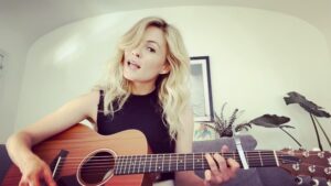 Lindsey Gort Instagram - it’s far from perfect but i had to do my hair and makeup today anyway so i told myself “don’t think twice, it’s alright” 
thank you @joshsiegelguitar for teaching this and feeding my @bobdylan obsession #cafecovidcovers #stayhome