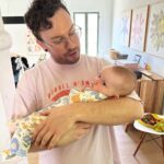 Liz Trinnear Instagram - Nico’s first plane ride & trip to California ☀️💕🥹 . 1. Pre plane ride pep talk 2. Snackin’ on the plane with dad 3. Uncle David came to pick us up! 4. Cuddles with Uncle Davie 5. One for caffeine, one for “we did it!” 6. Uncle Sean! 7 & 8. Daddy time 💕 9. Hanging with bestie Auggie Los Angeles, California