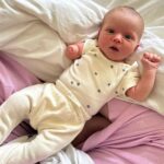Liz Trinnear Instagram - One month of Nico and we couldn’t be more in love and in awe of how much she’s grown. Our world has forever changed for the better with her in it. We found out about Nico’s limb difference at our 20 week ultrasound. I will never forget the moment and the way the room was spinning, or the feeling of Nat’s hand squeezing mine. I don’t think anyone can prepare you for a moment like that. Nico’s limb difference results from an unavoidable, undetectable occurrence that happens at around 6 weeks into fetal development where the limb stops growing. After meeting with a team of doctors and medical staff, there is one thing we are sure of - these kids are magical little beings who come into the world and show us their way, with happiness, strength and courage. They excel at “figuring it out.” Bit by bit we told our family and friends about Nico’s arm throughout the rest of our pregnancy. Each person showed us an immense amount of love and support and told us “we can’t wait to meet her” - we felt the same way. I remember texting a friend, “how can I be so proud of someone I haven’t even met yet?” And in all honesty, I have always been and I will always be so proud of her. Every milestone she passes, big or small. Growing up with a “difference” is something I am familiar with. I have Epidermolysis Bullosa Simplex, a condition that causes painful blistering of the skin. Thankfully Nico will never have the pain of EB, but she will face some obstacles. My difference taught me to look at the world with a kinder eye - you never know what someone is going through. My dream for Nico is that she never feels one ounce of limitation, and that she chases after anything she wants to do and achieve. One thing is for sure: she will do whatever she sets her mind to. Our Nico has been the special soul we’ve been waiting for for a long time. She’s perfect just the way she is and I cannot wait to watch her take on this world and show us that nothing will ever stop her. 💫🌈💕 #limbdifference #limbdifferenceawareness
