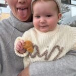 Liz Trinnear Instagram - 6 months with our baby bear 🐻 💕🥖 . . Sweater made by @jcorelli 🥹