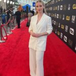 Liz Trinnear Instagram - Critics Choice Awards 2022✨ . Here’s a little behind the scenes look at @criticschoice - what a surreal feeling to be back out in the world, on a red carpet and interviewing people IRL. Special shout-out to the CCA crew for making the environment feel extra safe. @etalkctv . Outfit: @reformation Headband: @__ai.co #redcarpet #journalist #criticschoiceawards #getreadywithme Los Angeles, California