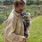 Liz Trinnear Instagram - My best friend in the best newborn carrier! It keeps her close, comfy and safe and the fabric is ultra soft and comfortable to wear (great for my sensitive skin). It’s safe to say: we both love it 💕 this is the Baby Carrier Mini in 3D Jersey by @babybjorn_northamerica available at @west_coast_kids