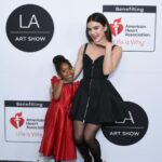 Lucy Hale Instagram - Giving my best black swan on Valentines Day hosting last nights @laartshow benefitting @american_heart ♥️ Thank you Scott, Kassandra, Nancy, & Fisher for having me & for donating 15% of ticket sales to the AHA ⭐️ And to angel team: @mollyddickson / @alexandermcqueen @clarke_johnson @jenna_filingeri @bridgetbragerhair @katrinakleinmakeup @colorbymattrez & @adamcampbellhair 🤍