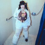 Lucy Loone Instagram - yo i’m grateful for everything. getting my album out and being able to perform it with amazing people for amazing people. thank you to everyone who has shown me support, love, and encouragement. this year will be a year of discipline, creativity, and expansion. love to the looney bin specifically 😘😘 happy new year to everybody may your blessings reach you in abundance 🤍 photos by @zak_watson 🚿 corset by @eddysonline 🧸 jewelry by @elitaemporium 👑 leg warmers by @heavensentandco 🕊
