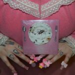 Lucy Loone Instagram - me and my baby. she’s just a little over three months. ain’t she gorgeous? her name is Eat it Up 💝 🥄 as promised, new batch of signed CDs available on @whippedblood now!!!!🩰💗 love you guys & hope you’ve been enjoying the album. thank you a million for the support and welcoming my baby into the world. she’s gonna do great things. xx