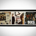 Luke Arnold Instagram - Back in Melbourne and one of the coolest gifts I’ve ever been given is hanging on the wall of the family home. The remade album covers from Never Tear Us Apart signed by the actual members of @officialinxs It was the greatest honour to tell this story alongside such legends. Still blows my mind