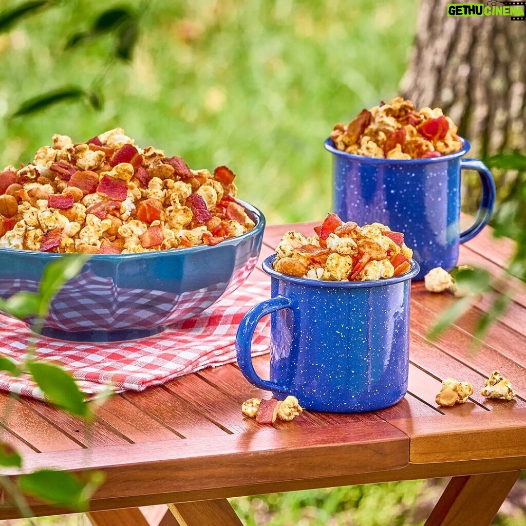 Luke Bryan Instagram - Excited for y’all to try out @farmlandfoods’ Maple Bacon Kettle Corn on #FarmTour2023. Come out to the Farmland Outdoor Adventure area or make it yourself with the recipe below: Farmland Maple Bacon Kettle Corn Prep time: 5 minutes Cook time: 10 minutes Serves: 4 Ingredients: 12 oz. Farmland Premium Maple Thick Cut Bacon, diced 3 tbsp. Vegetable Oil 3/4 cup Popcorn Kernels 3 tbsp. Light Brown Sugar, loosely packed 2 cups Honey Roasted Peanuts Directions: 1. Heat a skillet over medium-high heat and render the bacon pieces until crispy, then drain on paper towels. 2. Heat a heavy-bottomed pot over medium-high heat and add the oil. Heat until the oil just begins to shimmer. 3. Add the popcorn kernels in an even layer in the oil, then sprinkle the brown sugar evenly over the top. 4. Cover with a lid, leaving a crack for steam to vent, shaking occasionally until the kernels begin to pop. 5. Once the popcorn begins popping in earnest, shake constantly. 6. When the popping slows to 1 kernel per second, remove and dump immediately into a large bowl. 7. Add the rendered bacon and peanuts, and toss to combine. 8. Serve immediately, or allow to cool to room temperature and store for up to 2 days in an airtight container.