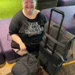 Magda Szubanski Instagram - Hey @jane13barnes !! Been proudly sporting and supporting your band all across US UK and EUROPE!! 😂❤️🙌 As well as flying the flag for Queer Sporting Alliance - their motto? “Can’t run, can’t throw” 😂 Singapore Changi Airport