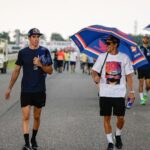 Marc Márquez Instagram - First day at #IndianGP ✌️Rainy trackwalk and great moment driving with @sureshraina3. #MM93 #MotoGP Buddh International Circuit