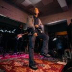 Marcell Siahaan Instagram - Acara ini berawal dari saya ‘menantang’ anak-anak @thehallwayspace_ @rillyrobbi untuk mereka menyelenggarakan sebuah konser intim di Hallway, sebuah tempat seru dan unik yang berada persis ditengah-tengah sebuah pasar basah tradisional jaman saya kecil bernama Pasar Kosambi, Bandung. Buat mereka yang minimal seangkatan dengan saya pasti tahu kalau disana adalah salah satu tempat terbaik membeli seragam sekolah dan juga seragam Pramuka beserta pernak-perniknya. Plus, Bandung Teater, sebuah bioskop yang sekarang berubah menjadi Hallway, yang didalamnya ada banyak sekali gerai ‘independen’ fashion, musik sampai kuliner. Menyenangkan sekali. Sebuah portal pertemuan, melting pot, tempat bertemunya banyak kalangan. Teman-teman bermusik di masa lampau seperti @gebegdrum @papapyopie @luki_govinda hadir disana, semua masih dalam keadaan sehat dan terus produktif. Hadir juga teman-teman dari kalangan disabilitas antara lain @guntur.abah dan teman-teman tuli yang khusus saya undang, dan tidak lupa meminta kepada penyelenggara menyediakan penerjemah bahasa isyarat demi kenyamanan mereka. Terima kasih kepada keluargaku, my Avengers, adik-adik musisi kesayangan @rishanda @renitamartadinata @jeffwatti @matthewmanwell @cesar_alkautsar @ivanalidiyan @imotimot dan masku @eugen.bounty GILAAAA! Walaupun udara panas banget, rebutan oksigen, tapi selalu maksimal. ❤️ Adikku, anakku, @mraviandika untuk duet maut kita di ‘Firasat’, THANK YOU, Sir! ❤️ Tim produksi MARCELL yang fantastik @anggianggoro @rickysophian @harfiovan @reyhin1603 @boyblackcurrant @heruusiswanto dibawah komando @gafurdinno ✅ Dan tentunya Kasubdit Ketampanan @ronaldreborn dan Kasubdit Dokumentasi dan Sejarah @bengurion.works yang super, dan Staf Khusus @shandy_age dan Kepala Rumah Tangga @ganjar.tribowo ✅ Dan mereka yang hadir sebagai support besar, adik-adik tersayang @filinno @zanninaaa @juliuzickboy @magentaparamita @awisnuw Michaela dan anakku ‘Kribo Neraka’ @keenahrah , TERIMA KASIH! ❤️ Team @mahatidana_fight.camp @lendengndgank yang juga hadir, hatur nuhun, Warriors! Thank you @mrahotel and Mannery Eatery for hospitality. Bandung, kenanganmu terlalu indah. Indonesia
