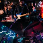Marcell Siahaan Instagram - Acara ini berawal dari saya ‘menantang’ anak-anak @thehallwayspace_ @rillyrobbi untuk mereka menyelenggarakan sebuah konser intim di Hallway, sebuah tempat seru dan unik yang berada persis ditengah-tengah sebuah pasar basah tradisional jaman saya kecil bernama Pasar Kosambi, Bandung. Buat mereka yang minimal seangkatan dengan saya pasti tahu kalau disana adalah salah satu tempat terbaik membeli seragam sekolah dan juga seragam Pramuka beserta pernak-perniknya. Plus, Bandung Teater, sebuah bioskop yang sekarang berubah menjadi Hallway, yang didalamnya ada banyak sekali gerai ‘independen’ fashion, musik sampai kuliner. Menyenangkan sekali. Sebuah portal pertemuan, melting pot, tempat bertemunya banyak kalangan. Teman-teman bermusik di masa lampau seperti @gebegdrum @papapyopie @luki_govinda hadir disana, semua masih dalam keadaan sehat dan terus produktif. Hadir juga teman-teman dari kalangan disabilitas antara lain @guntur.abah dan teman-teman tuli yang khusus saya undang, dan tidak lupa meminta kepada penyelenggara menyediakan penerjemah bahasa isyarat demi kenyamanan mereka. Terima kasih kepada keluargaku, my Avengers, adik-adik musisi kesayangan @rishanda @renitamartadinata @jeffwatti @matthewmanwell @cesar_alkautsar @ivanalidiyan @imotimot dan masku @eugen.bounty GILAAAA! Walaupun udara panas banget, rebutan oksigen, tapi selalu maksimal. ❤️ Adikku, anakku, @mraviandika untuk duet maut kita di ‘Firasat’, THANK YOU, Sir! ❤️ Tim produksi MARCELL yang fantastik @anggianggoro @rickysophian @harfiovan @reyhin1603 @boyblackcurrant @heruusiswanto dibawah komando @gafurdinno ✅ Dan tentunya Kasubdit Ketampanan @ronaldreborn dan Kasubdit Dokumentasi dan Sejarah @bengurion.works yang super, dan Staf Khusus @shandy_age dan Kepala Rumah Tangga @ganjar.tribowo ✅ Dan mereka yang hadir sebagai support besar, adik-adik tersayang @filinno @zanninaaa @juliuzickboy @magentaparamita @awisnuw Michaela dan anakku ‘Kribo Neraka’ @keenahrah , TERIMA KASIH! ❤️ Team @mahatidana_fight.camp @lendengndgank yang juga hadir, hatur nuhun, Warriors! Thank you @mrahotel and Mannery Eatery for hospitality. Bandung, kenanganmu terlalu indah. Indonesia