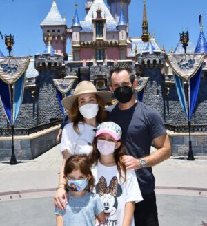Marla Sokoloff Instagram - We’re back! 🐭
✨Alec thoroughly enjoyed waiting in line for this photo. ✨ EDIT : masks are required friends or Mickey kicks you out. 🌟
.
.
#disneyland #disney #disneyfamily #cinderellacastle #familyphoto