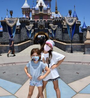 Marla Sokoloff Instagram - We’re back! 🐭
✨Alec thoroughly enjoyed waiting in line for this photo. ✨ EDIT : masks are required friends or Mickey kicks you out. 🌟
.
.
#disneyland #disney #disneyfamily #cinderellacastle #familyphoto