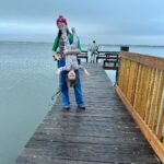 Mary Katharine Ham Instagram - Second Christmas at the beach, featuring some excellent kid-wrangling by me (and my bro-in-law in the background). Exploring some piers, making sure my toddler doesn’t jump in, seeing the aquarium. 🌊🎄🐠
