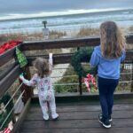 Mary Katharine Ham Instagram - Second Christmas at the beach, featuring some excellent kid-wrangling by me (and my bro-in-law in the background). Exploring some piers, making sure my toddler doesn’t jump in, seeing the aquarium. 🌊🎄🐠