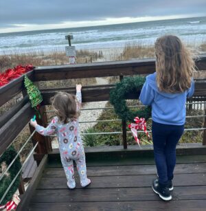 Mary Katharine Ham Instagram - Second Christmas at the beach, featuring some excellent kid-wrangling by me (and my bro-in-law in the background). Exploring some piers, making sure my toddler doesn’t jump in, seeing the aquarium. 🌊🎄🐠