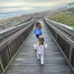 Mary Katharine Ham Instagram - Second Christmas at the beach, featuring some excellent kid-wrangling by me (and my bro-in-law in the background). Exploring some piers, making sure my toddler doesn’t jump in, seeing the aquarium. 🌊🎄🐠
